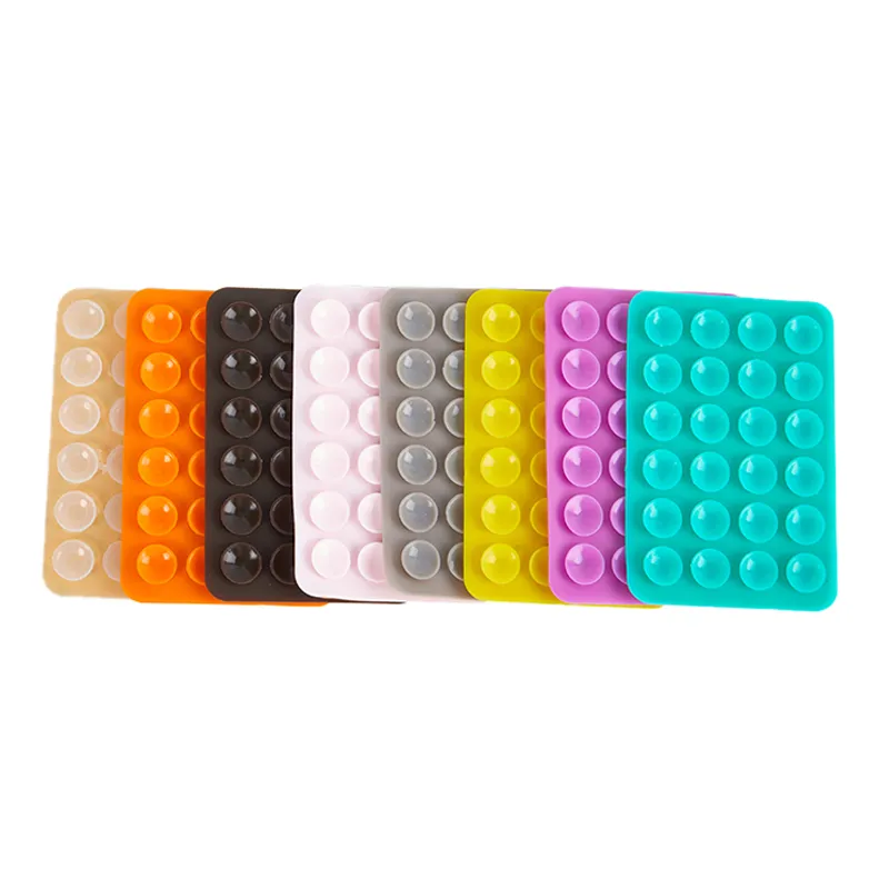 Stick & Grip Suction Cup Phone Holder | Reusable Silicone Pad | Random Color